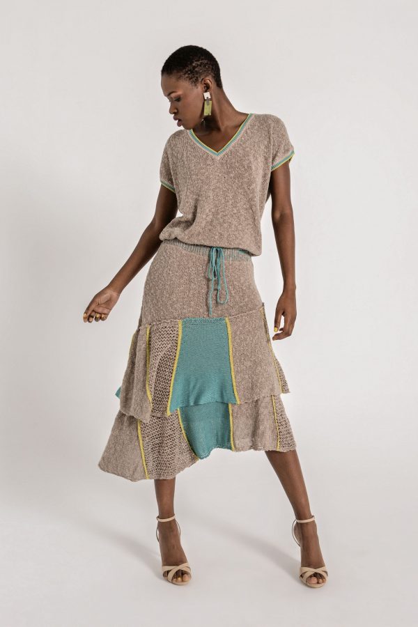 Midi textured knit dress, featuring loose top with short sleeves and V neckline, elastic waist with a cord belt and ruflled skirt with panel