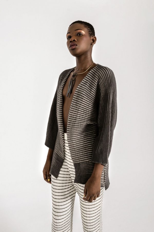 An everyday luxury. Textured knit cardigan, with 3/4 sleeves and open front