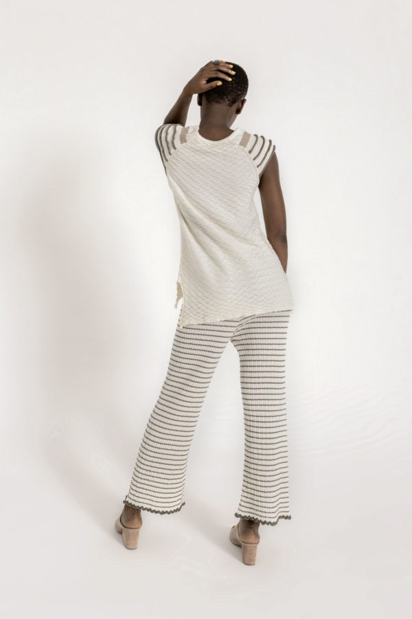 Wide leg textured knit pants, with elastic waist, contrasting stripes and ruffled extremes