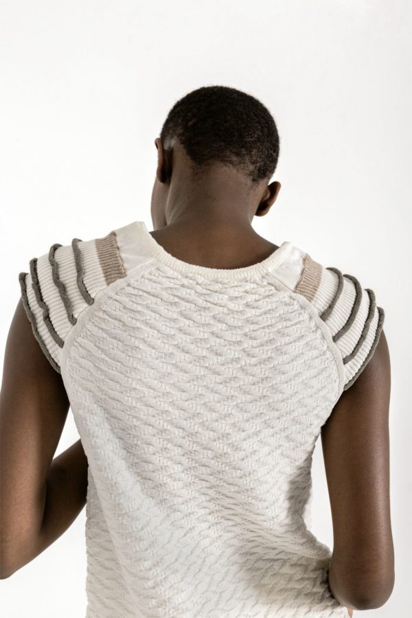 Sleeveless textured knit top with contrasting details on shoulders